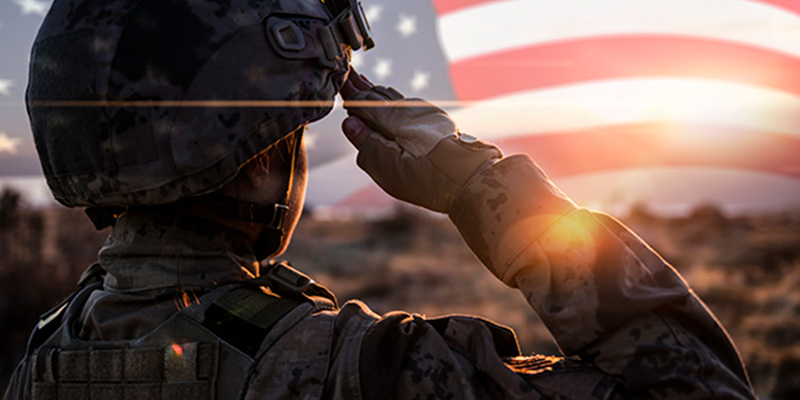 American solder saluting our flag